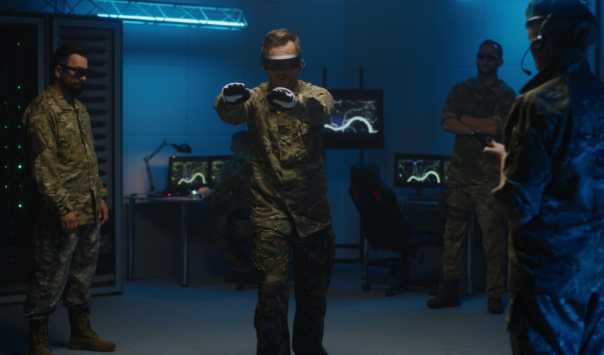 an image of a soldier with a VR headset on training with colleagues