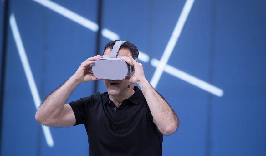 virtual reality history - Facebook's Vice President of Virtual Reality, Hugo Barra wearing a standalone VR headset.