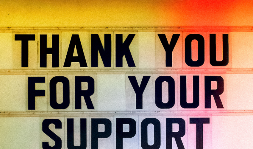 Neon sign saying 'Thank you for your support' representing addressing the people side of change in Prosci Change Management.