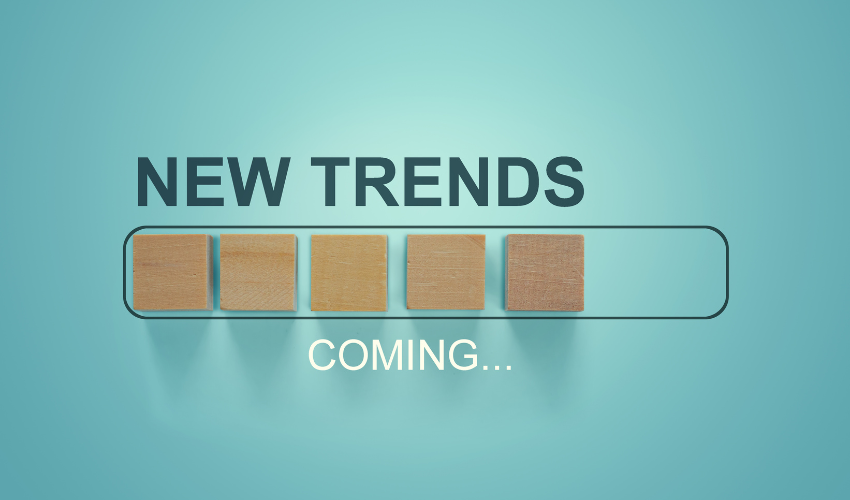 The words "NEW TRENDS COMING..." next to empty blocks ready to be filled, illustrating the anticipation of future directions in project management.